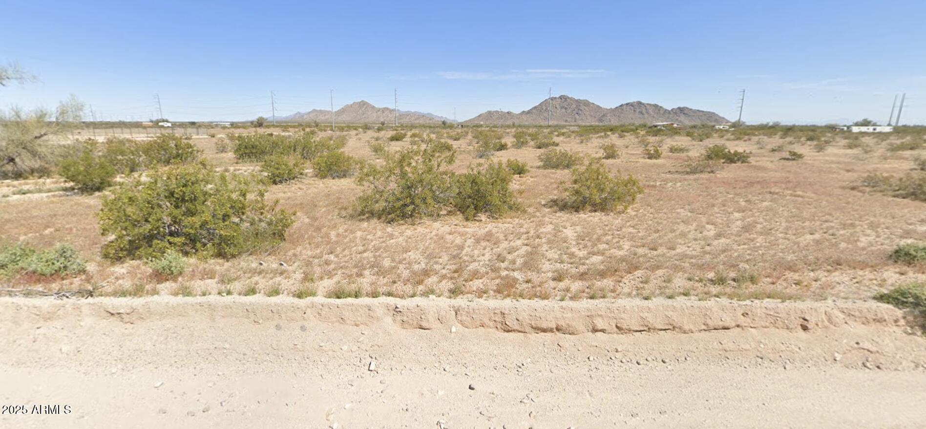 0 West Quail Run Road Maricopa, AZ 85139 - Photo 2 of 3 a view of mountain with a lake view