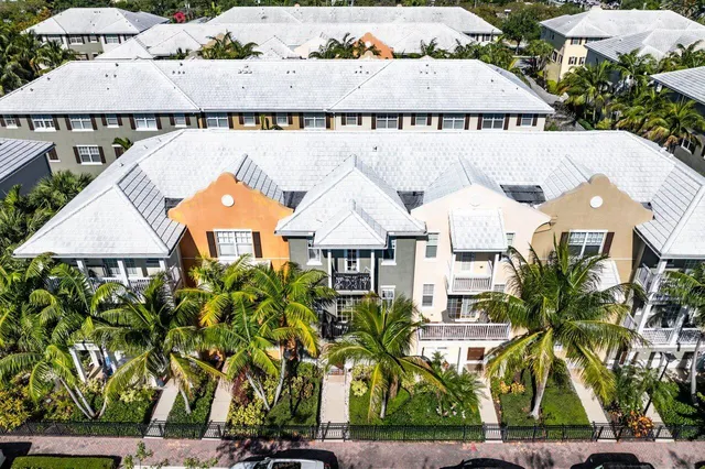 a picture of a house with a potted plant