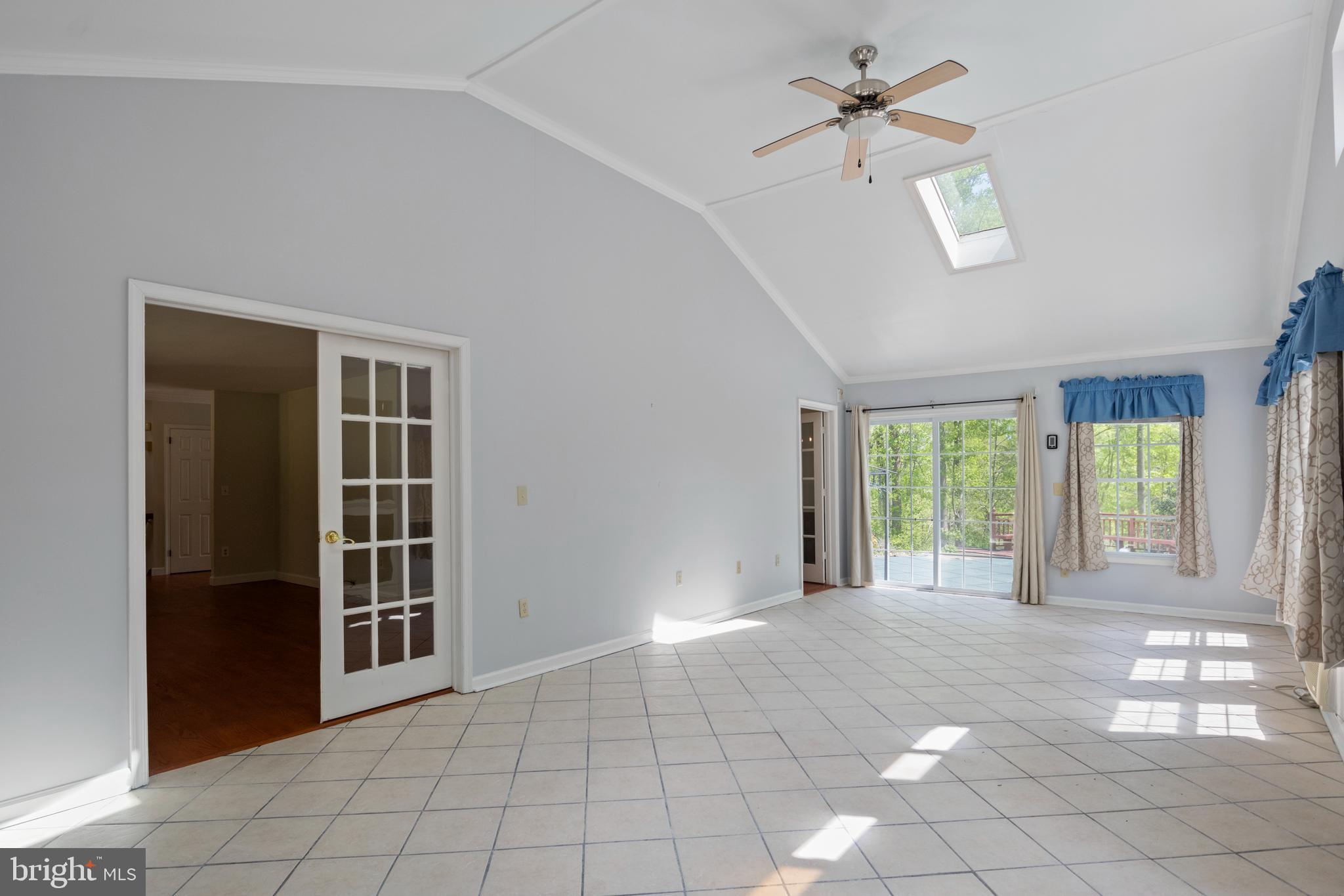 2162 Smoky Road Huntingtown, MD 20639 - Photo 12 of 38 Sunroom -fan, skylight, entrance from Living room