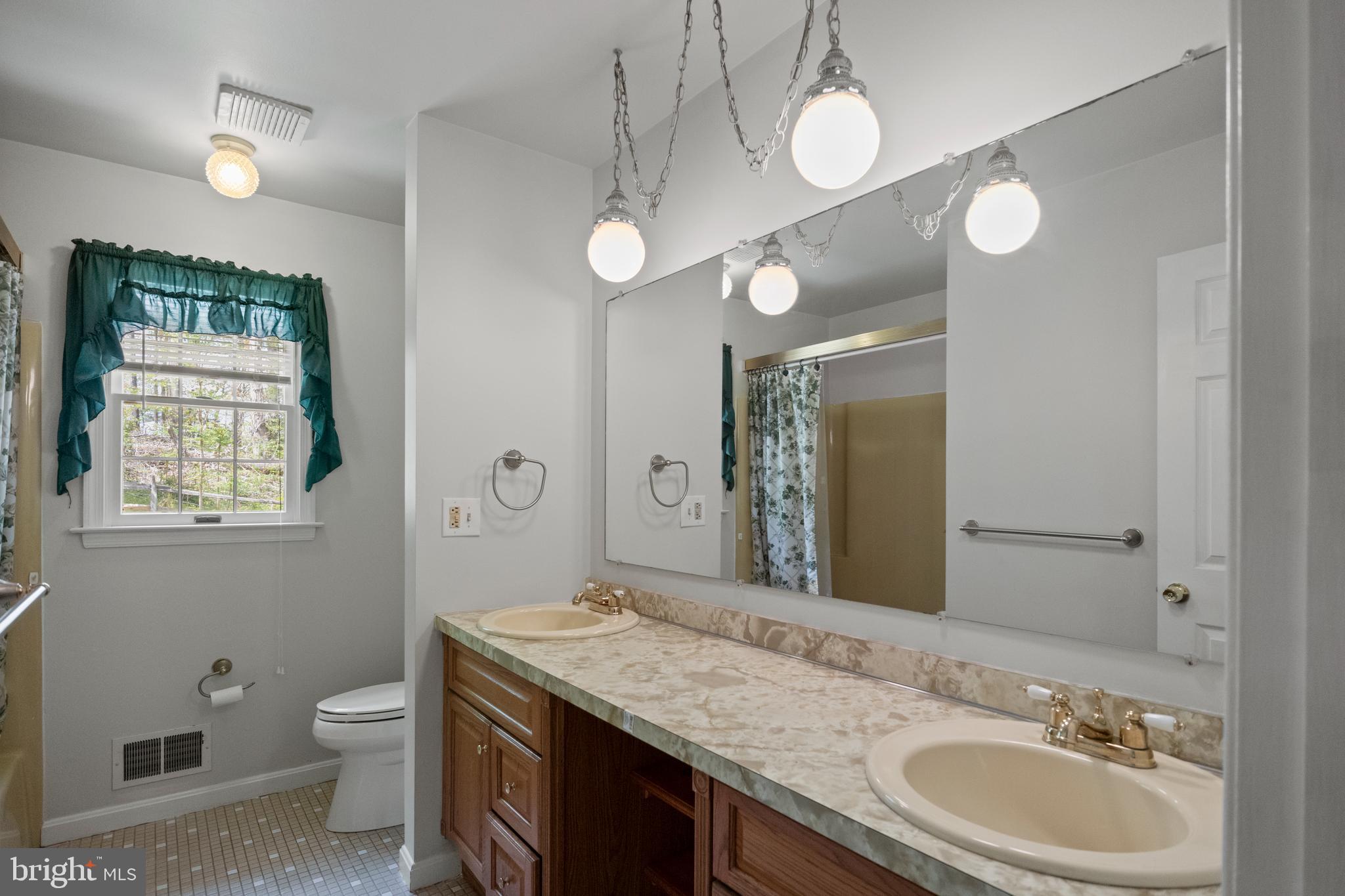 2162 Smoky Road Huntingtown, MD 20639 - Photo 22 of 38 Hall Full Bath with double sinks