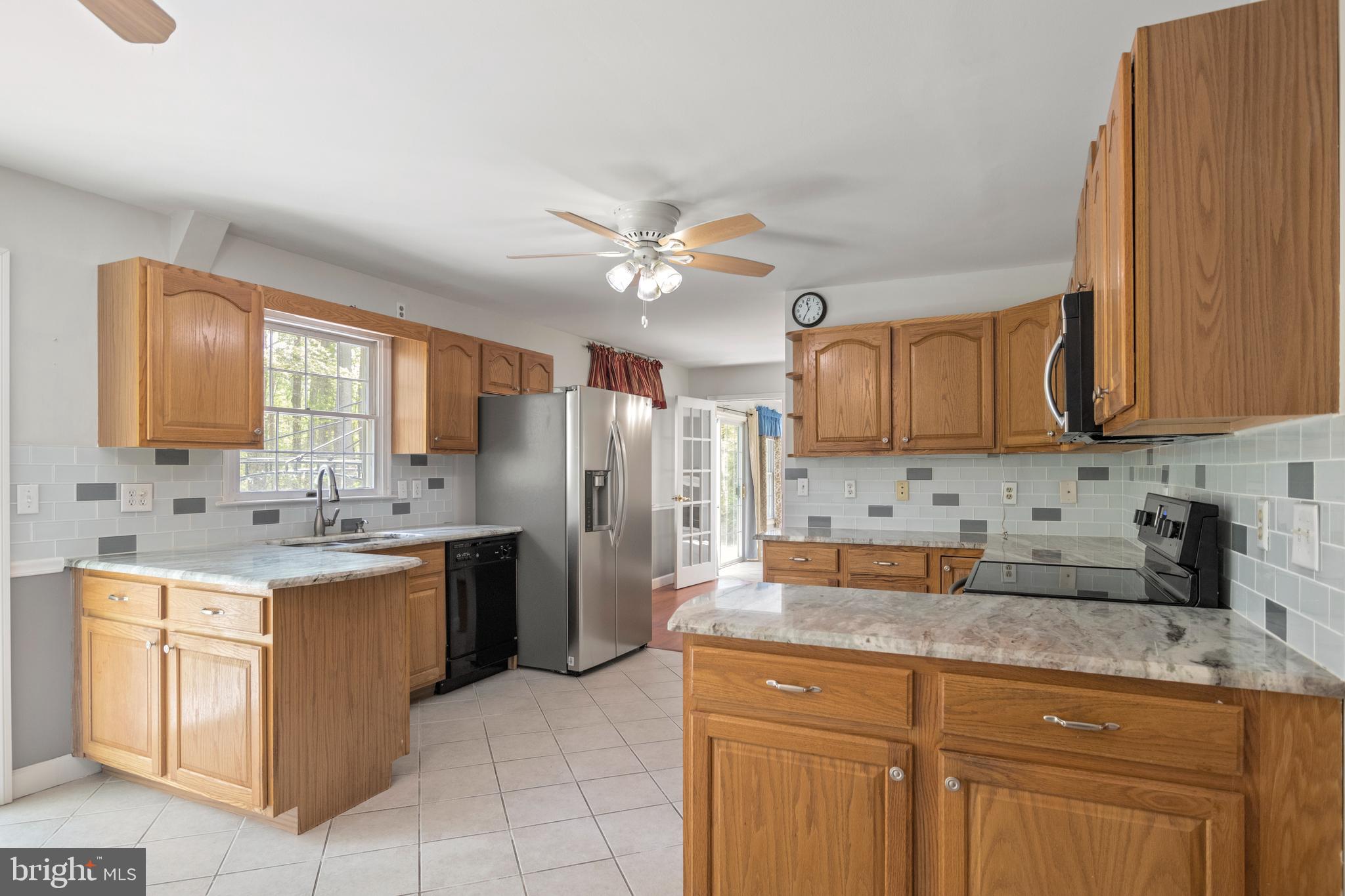 2162 Smoky Road Huntingtown, MD 20639 - Photo 3 of 38 Large Kitchen with view of yard