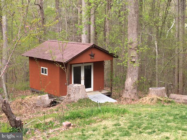 2162 Smoky Road Huntingtown, MD 20639 - Photo 32 of 38 Custom built shed with double thermal glass doors