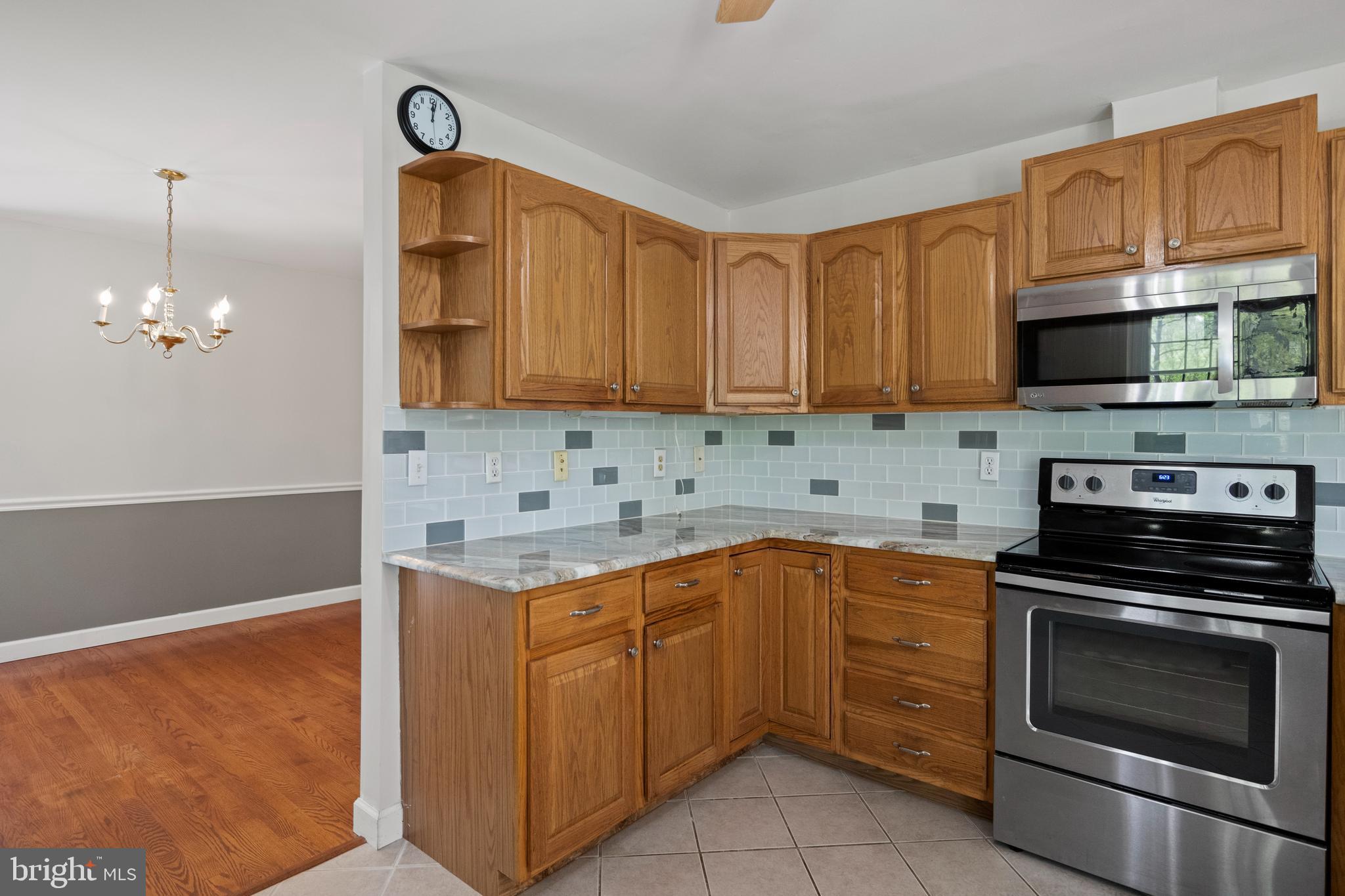 2162 Smoky Road Huntingtown, MD 20639 - Photo 5 of 38 Kitchen - Cabinets & Stainless glass top stove