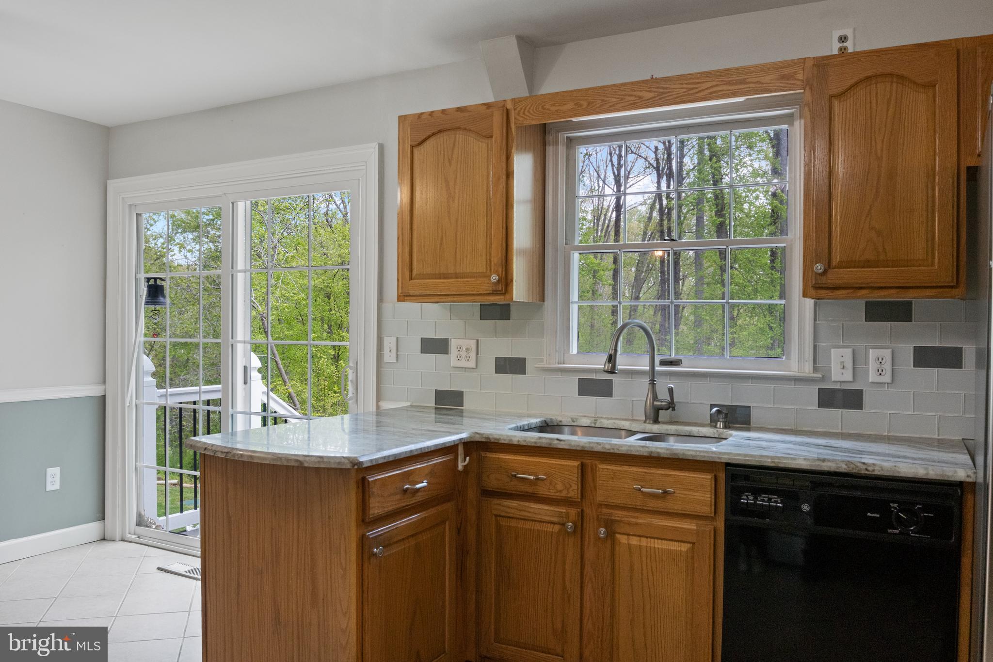 2162 Smoky Road Huntingtown, MD 20639 - Photo 6 of 38 Kitchen - with patio door to deck & pool