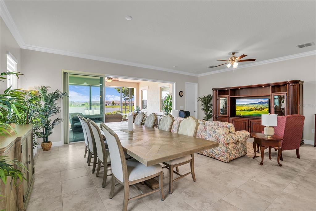 2665 Meadowedge Loop St. Cloud, FL 34772 - Photo 16 of 53 a view of a dining room with furniture