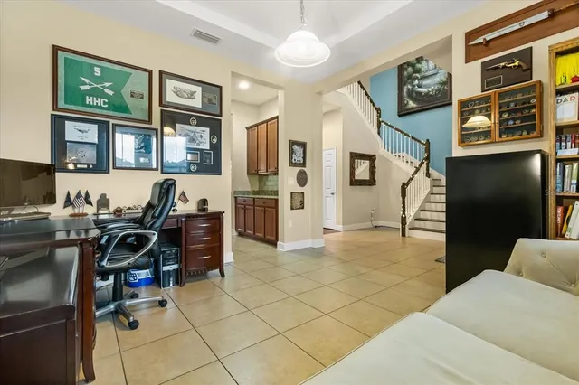 an aerial view of a house with a ocean view