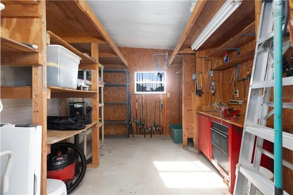 a view of an entryway with a kitchen