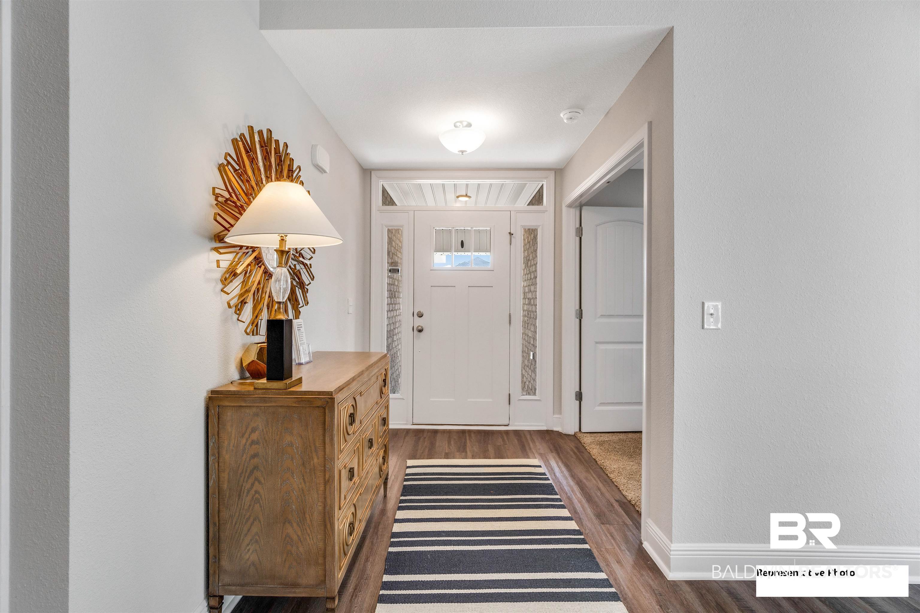 643 Mayflower Drive Foley, AL 36535 - Photo 14 of 34 Foyer featuring dark wood finished floors and baseboards