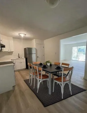 a view of a dining room with furniture