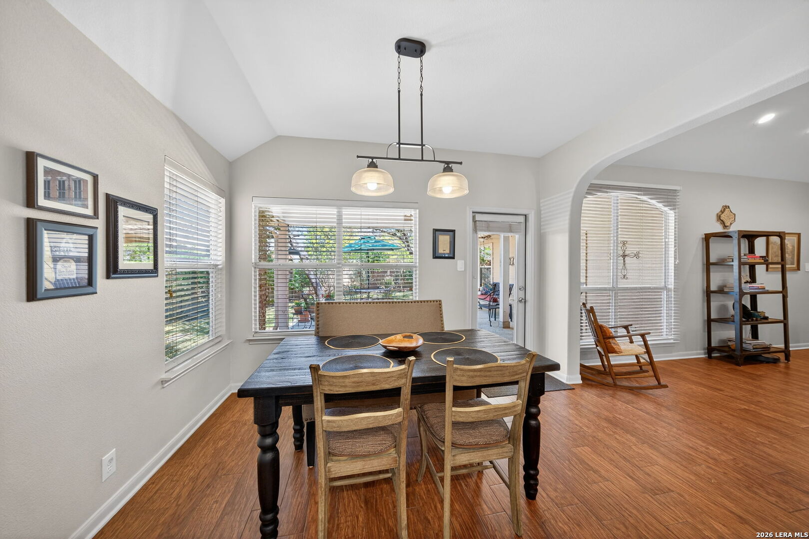 9331 Tyler Oaks Helotes, TX 78023 - Photo 11 of 47 a view of a dining room with furniture window and wooden floor