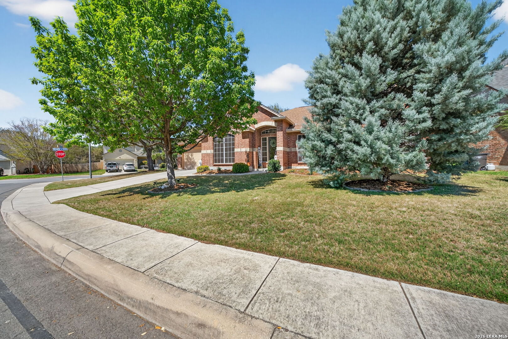 9331 Tyler Oaks Helotes, TX 78023 - Photo 2 of 47 a view of a house with a yard