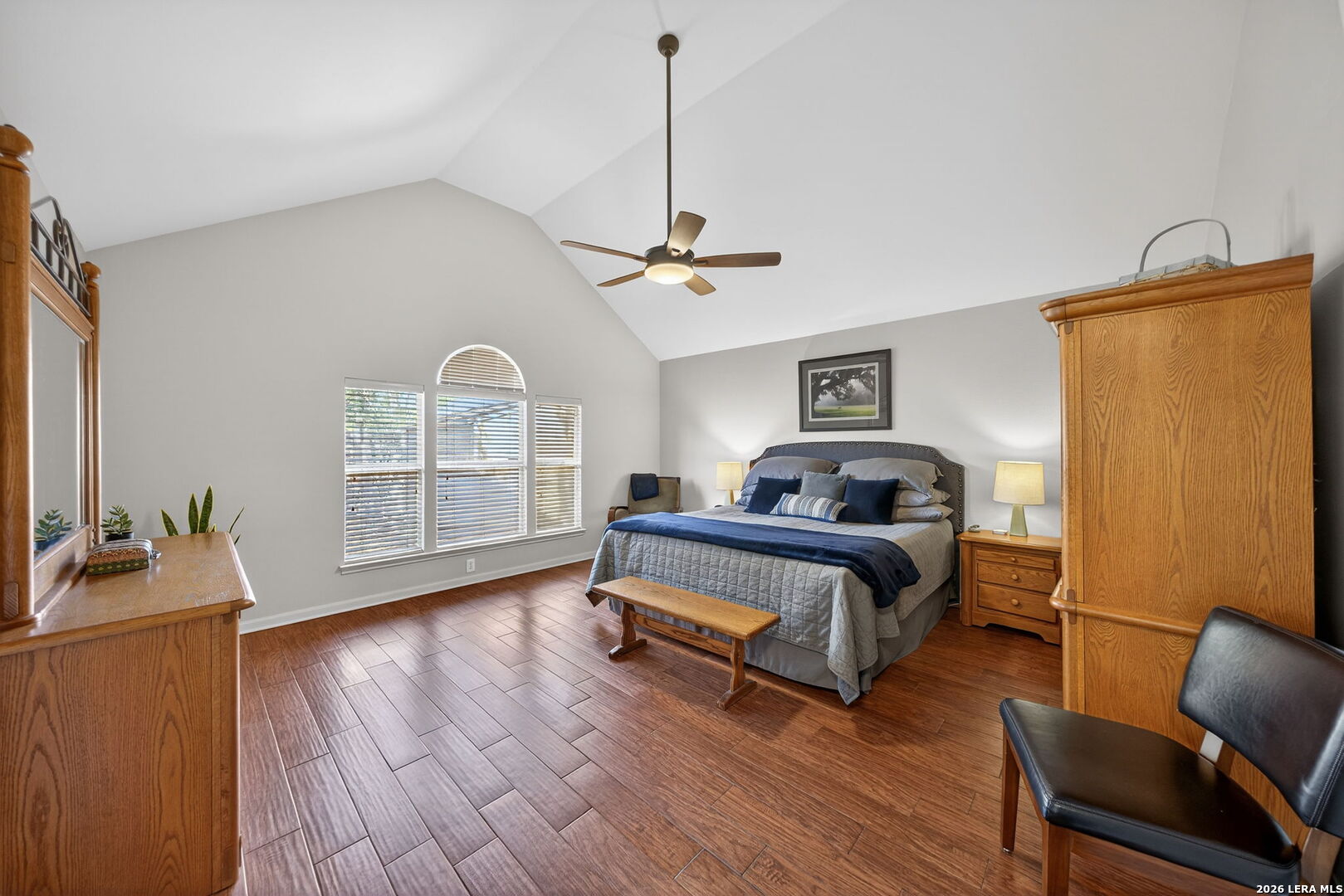 9331 Tyler Oaks Helotes, TX 78023 - Photo 22 of 47 a bedroom with furniture and wooden floor