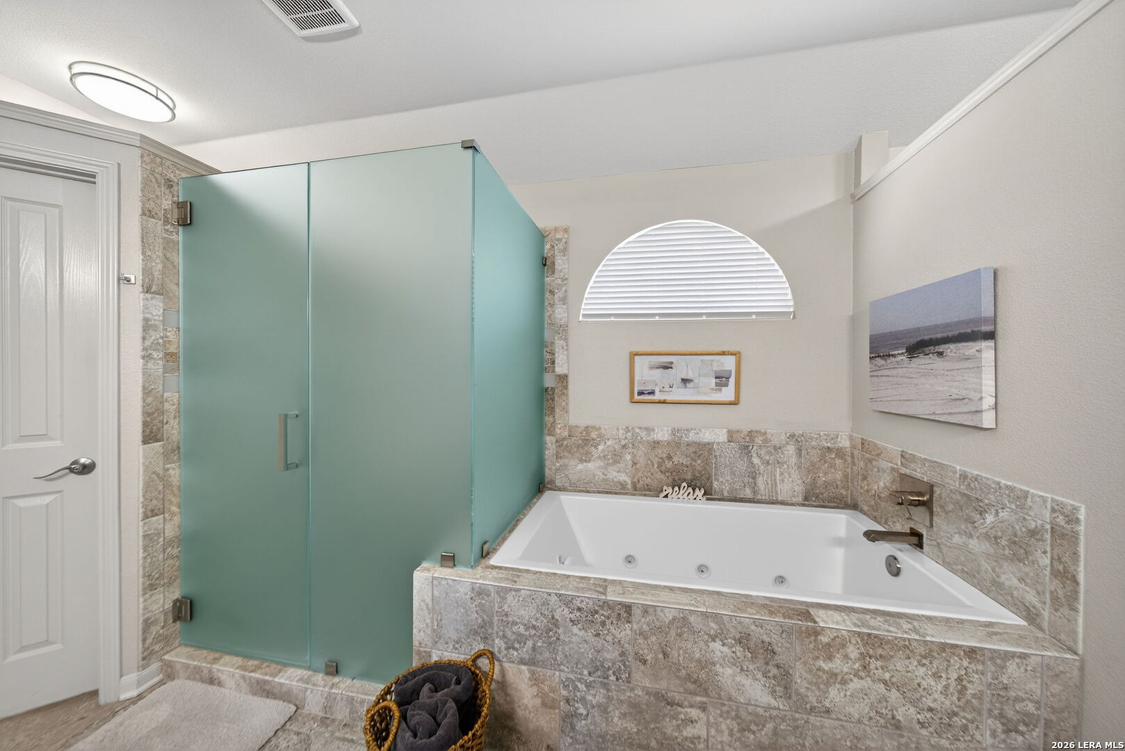 9331 Tyler Oaks Helotes, TX 78023 - Photo 28 of 47 a bathroom with a tub and a shower