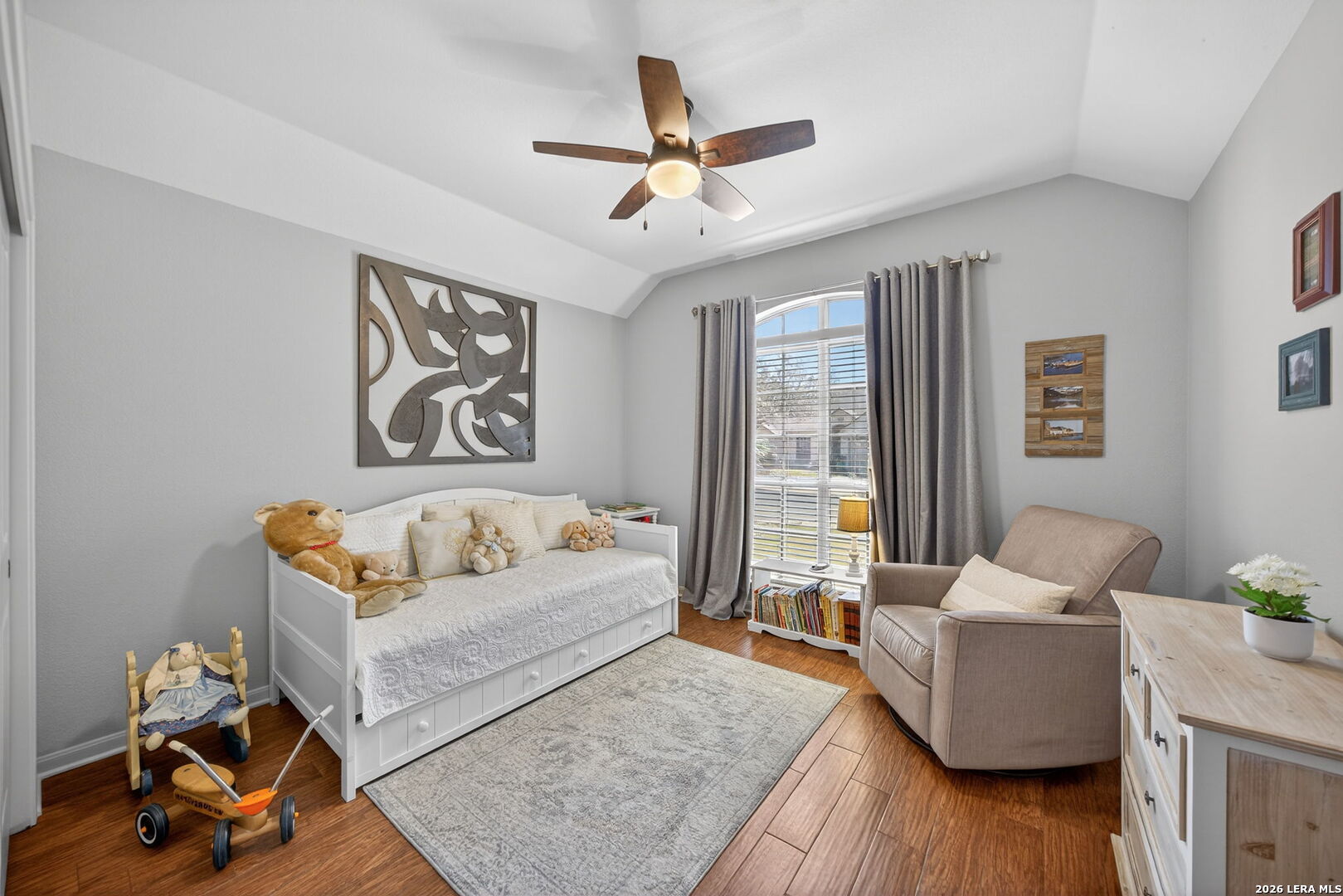 9331 Tyler Oaks Helotes, TX 78023 - Photo 32 of 47 a living room with furniture and a large window