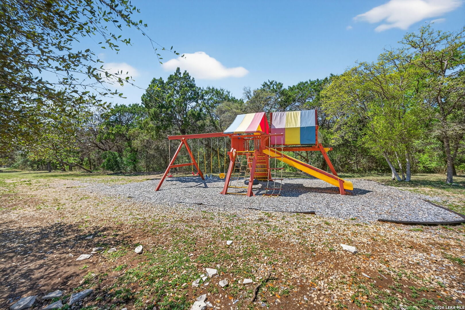 9331 Tyler Oaks Helotes, TX 78023 - Photo 44 of 47 a view of outdoor space with playground and green space