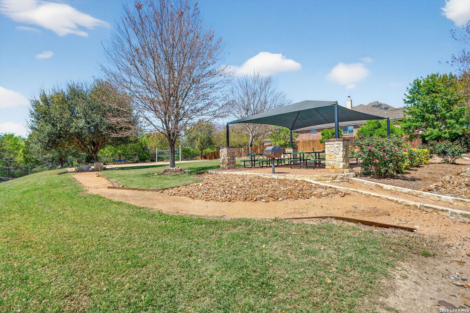 9331 Tyler Oaks Helotes, TX 78023 - Photo 45 of 47 a view of a yard with a table and chairs