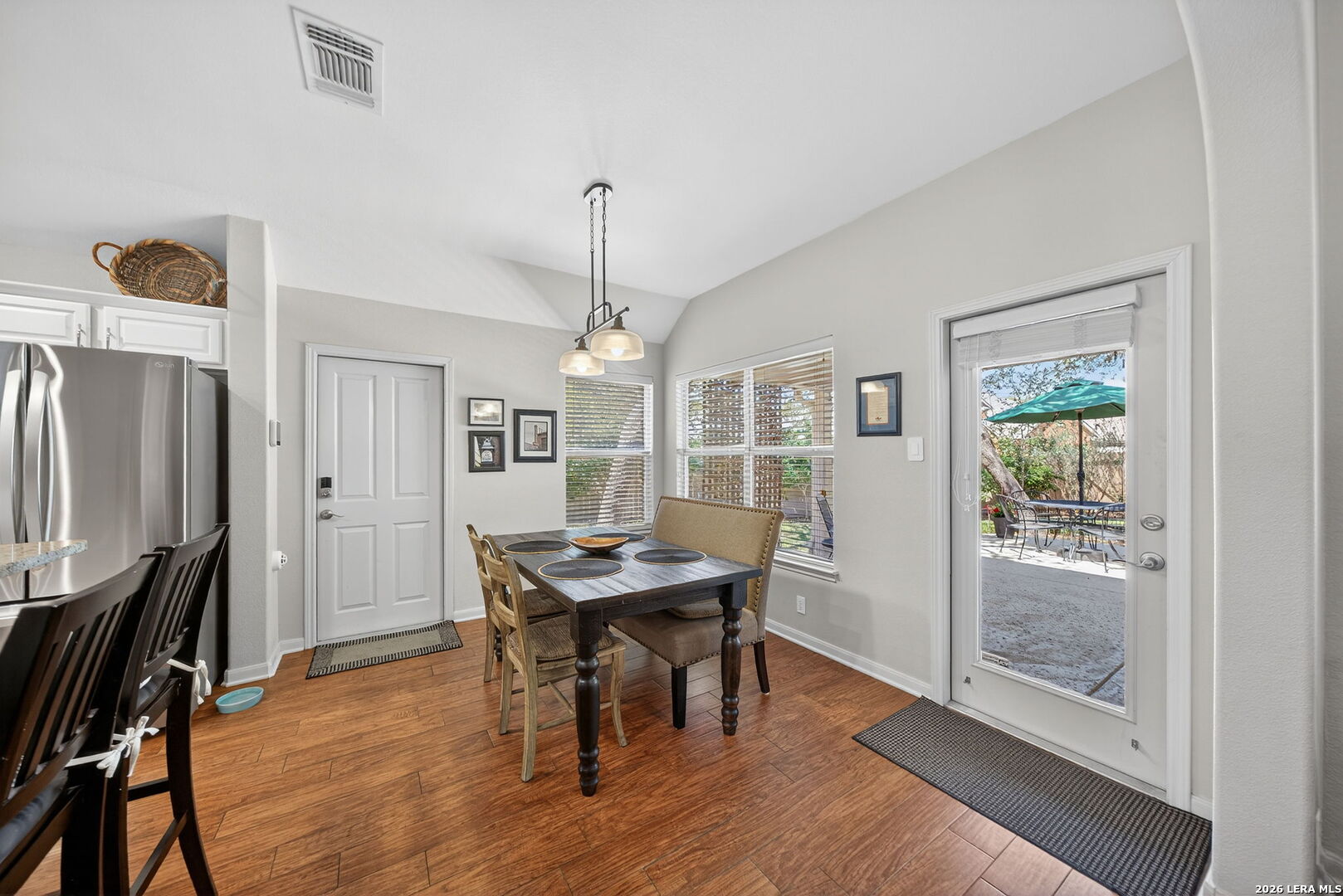 9331 Tyler Oaks Helotes, TX 78023 - Photo 10 of 47 a view of a dining room with furniture window and wooden floor