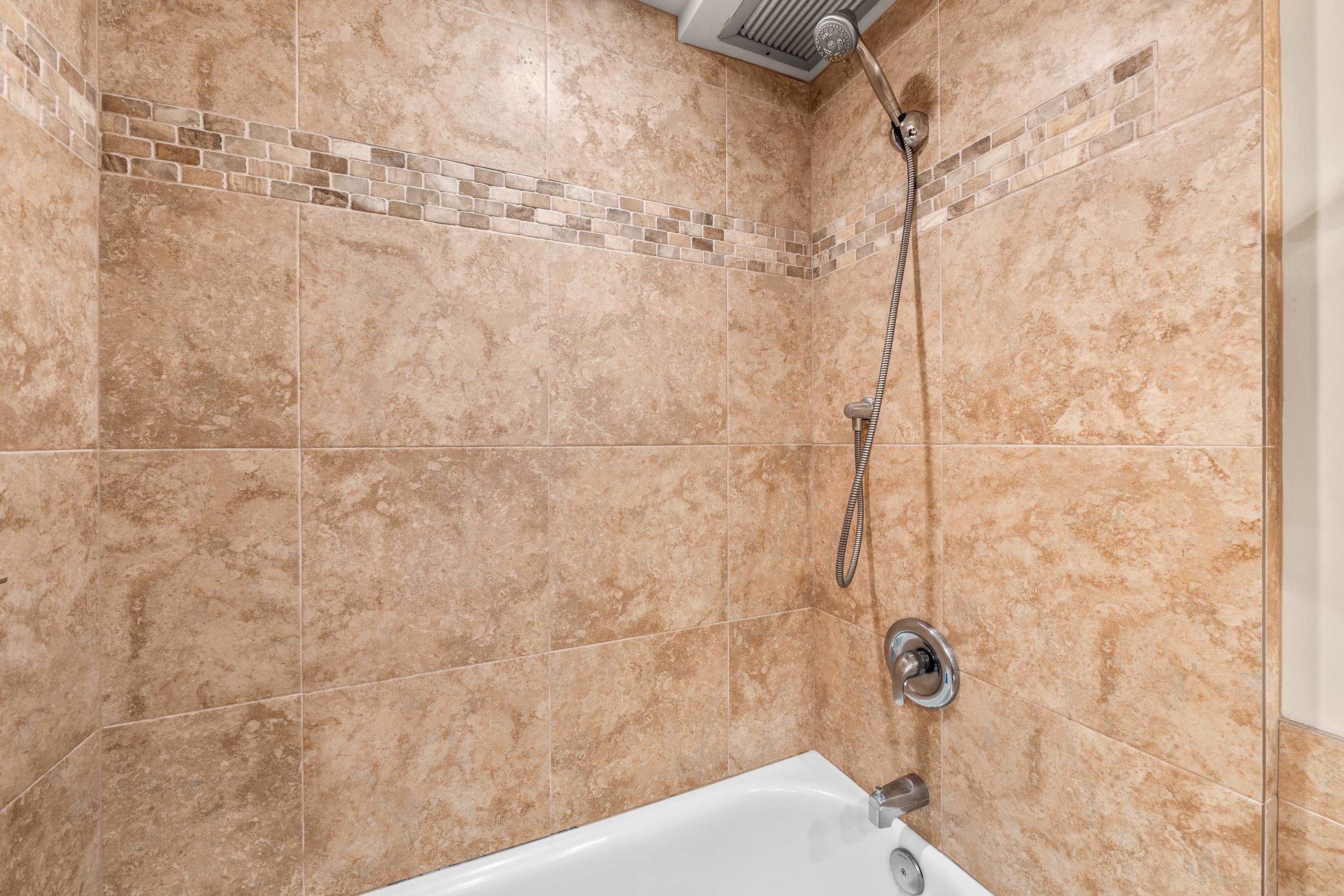 2960 South Kihei Road, Unit 310 Kihei, HI 96753 - Photo 23 of 35 a bathroom with a shower
