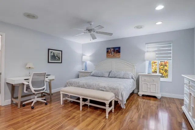 a bedroom with a bed and furniture