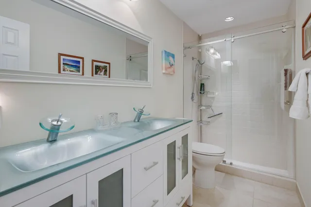 a living room with furniture a couch and wooden floor