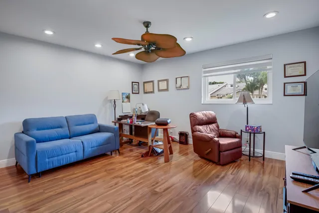 a room with furniture and wooden floor