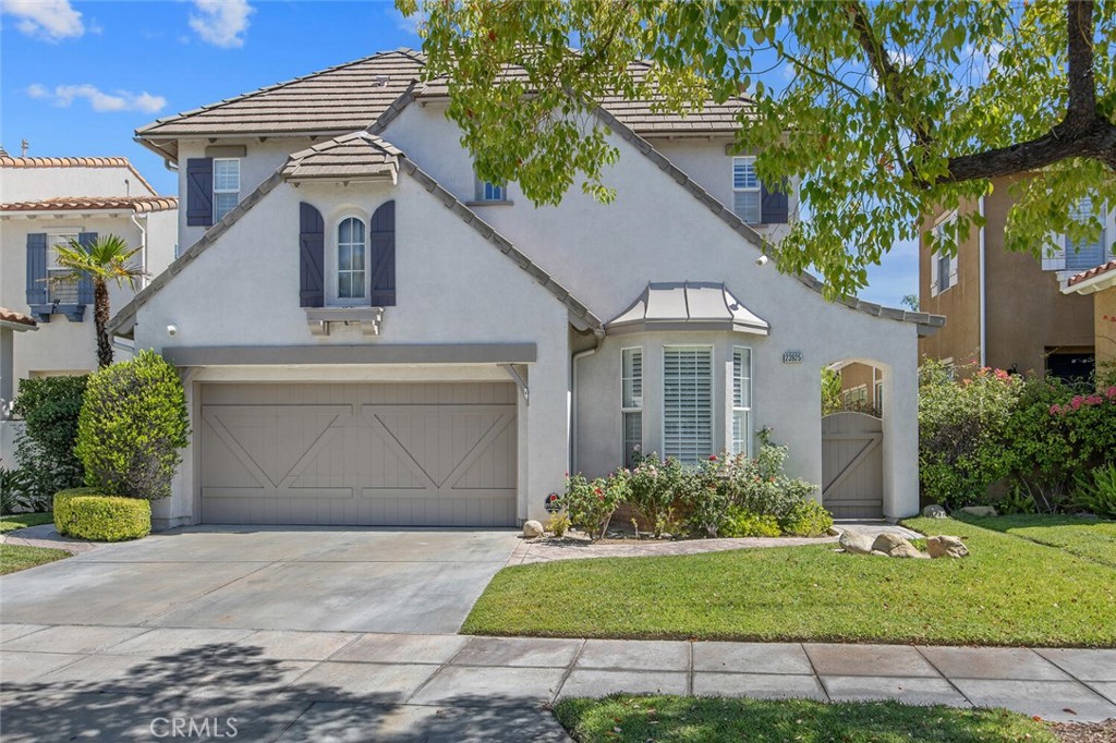 23925 Lakeside Road Valencia, CA 91355 - Photo 1 of 1 a front view of a house with garden