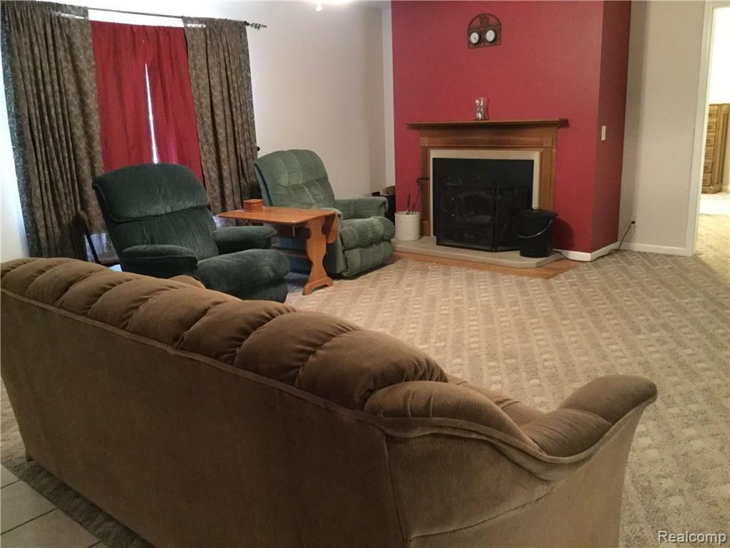 4711 Martin Road Capac, MI 48014 - Photo 10 of 29 Living room with natural fireplace