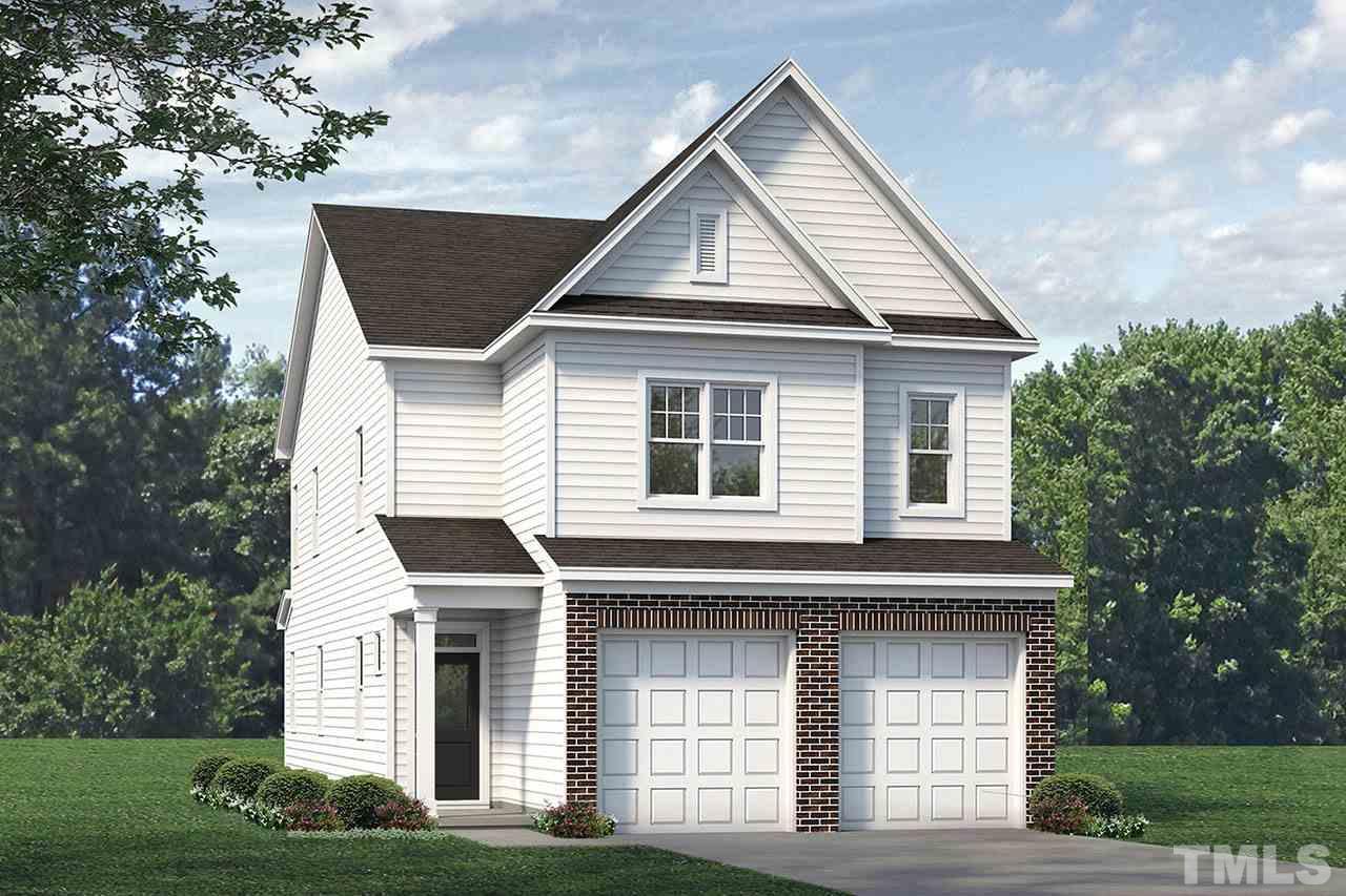 3709 Stark Road Raleigh, NC 27610 - Photo 1 of 1 a front view of a house with a yard