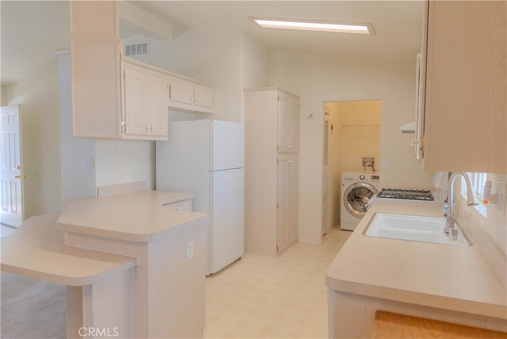 2140 Mentone, Unit 3 Mentone, CA 92359 - Photo 11 of 45 a bathroom with a sink a toilet and a tub