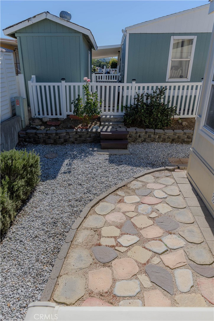 2140 Mentone, Unit 3 Mentone, CA 92359 - Photo 25 of 45 a view of a pathway with a yard