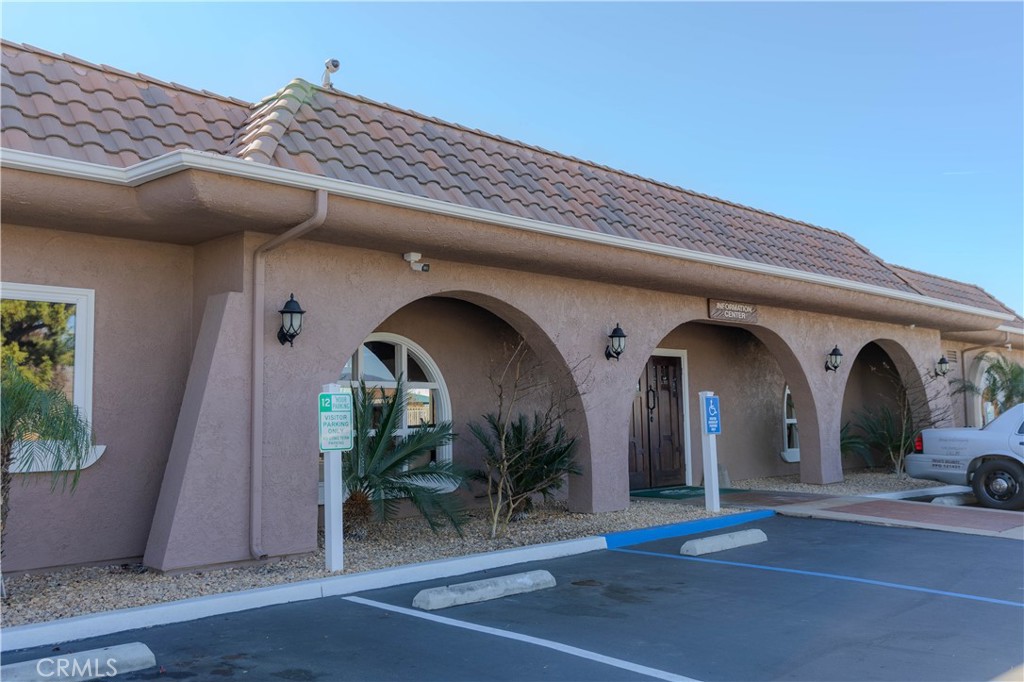 2140 Mentone, Unit 3 Mentone, CA 92359 - Photo 28 of 45 a view of front door with potted plants