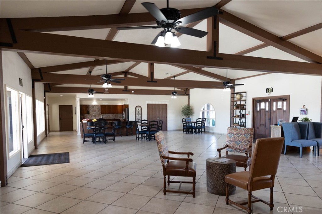 2140 Mentone, Unit 3 Mentone, CA 92359 - Photo 29 of 45 a view of a dining room with furniture chandelier and a rug