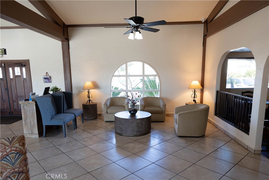 2140 Mentone, Unit 3 Mentone, CA 92359 - Photo 30 of 45 a living room with furniture and a large window