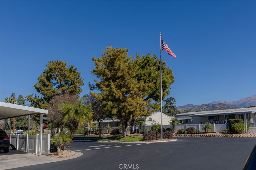 2140 Mentone, Unit 3 Mentone, CA 92359 - Photo 37 of 45 a city street lined with buildings and trees