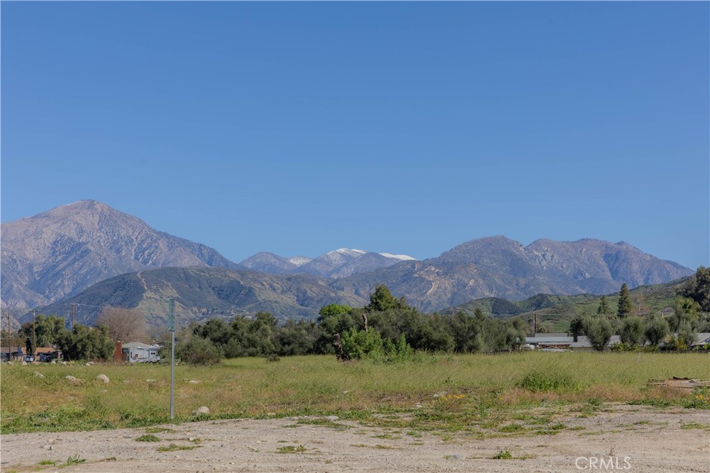 2140 Mentone, Unit 3 Mentone, CA 92359 - Photo 39 of 45 a view of a town with mountains in the background