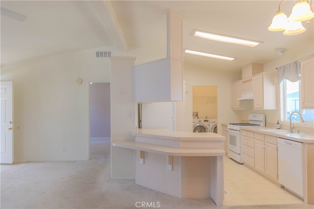 2140 Mentone, Unit 3 Mentone, CA 92359 - Photo 10 of 45 a bathroom with a sink vanity and a mirror