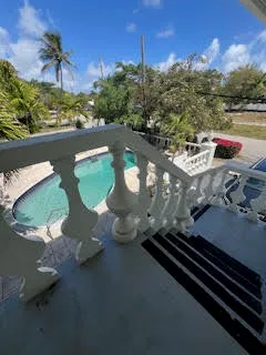 a view of a back yard of the house