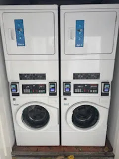 a view of washer and dryer in a utility room