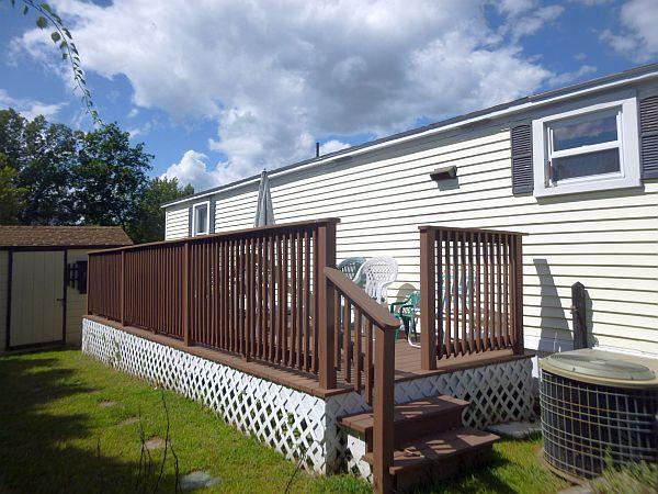 25 Groton School Road, Unit 35 Ayer, MA 01432 - Photo 3 of 6 a view of a wrought iron fences in front of house