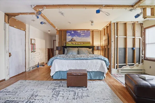 a view of a room with wooden walls