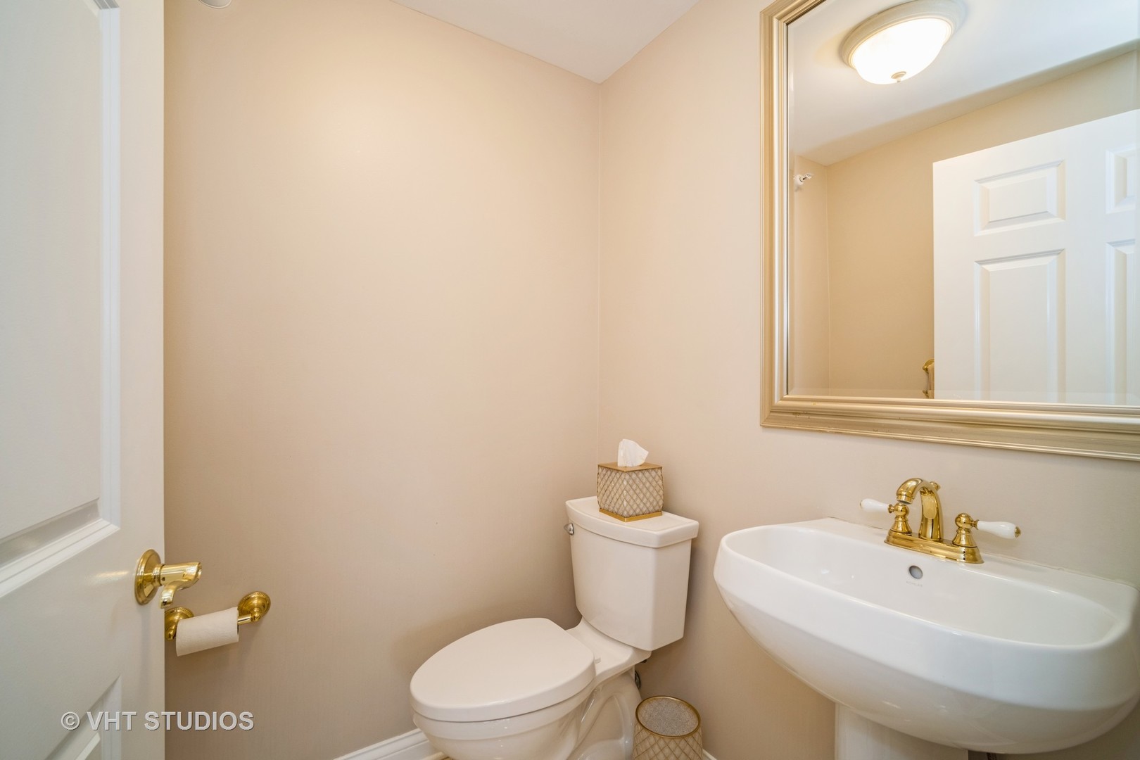 2365 Waukegan Road, Unit 3D Northbrook, IL 60062 - Photo 11 of 21 a bathroom with a sink a toilet and mirror