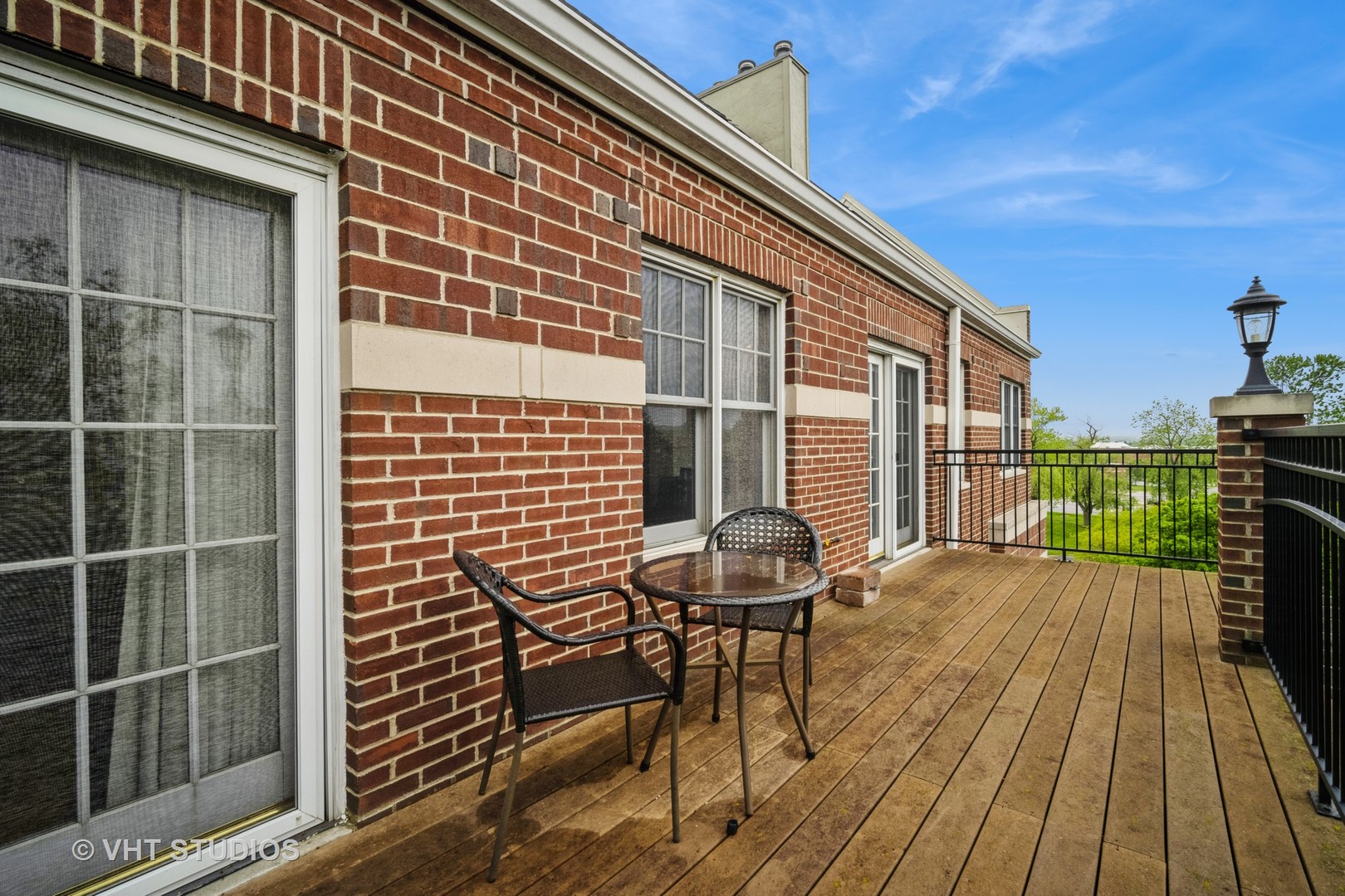 2365 Waukegan Road, Unit 3D Northbrook, IL 60062 - Photo 20 of 21 a balcony with table and chairs