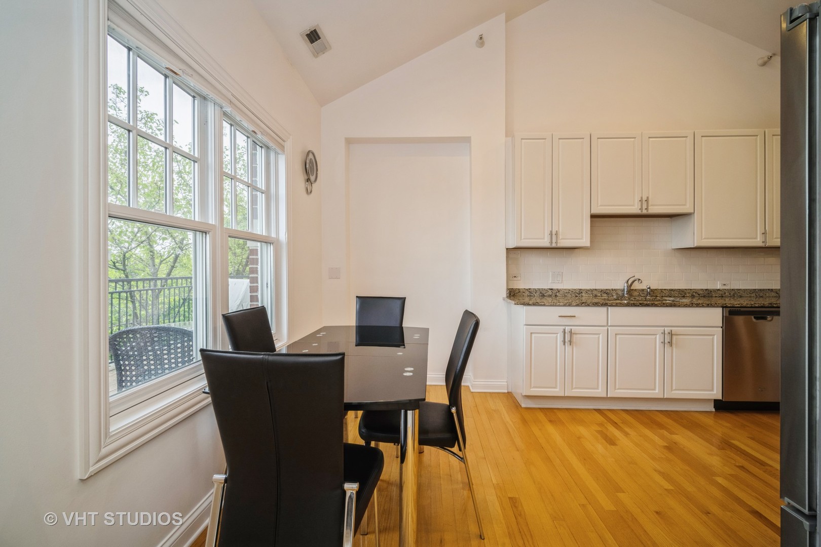 2365 Waukegan Road, Unit 3D Northbrook, IL 60062 - Photo 6 of 21 a view of a dining room with furniture and a window