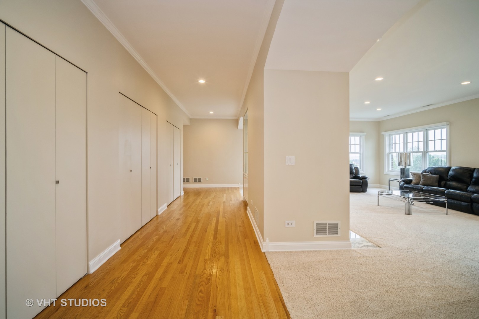 2365 Waukegan Road, Unit 3D Northbrook, IL 60062 - Photo 9 of 21 a view of a living room filled with furniture and a rug