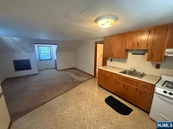 a room with furniture and window