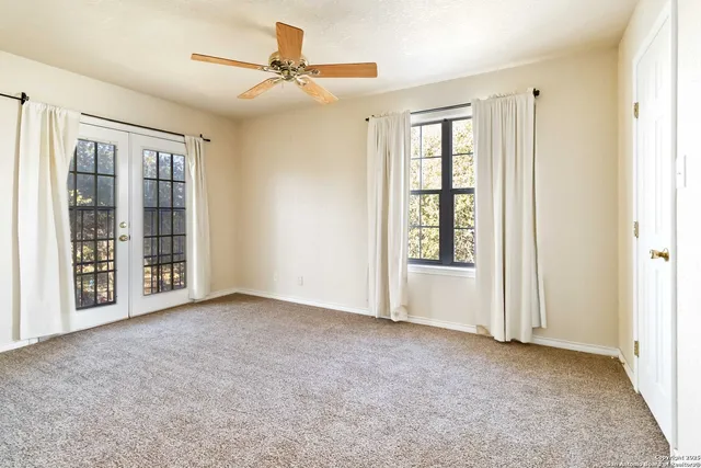 a bathroom with a sink a mirror and a shower