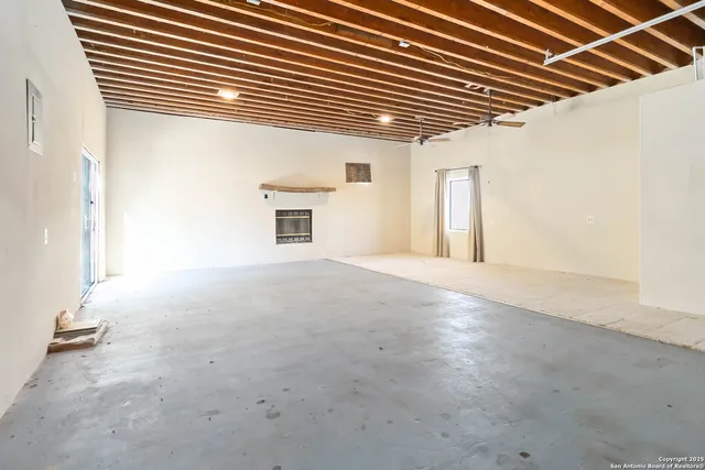 a bathroom with a toilet a sink and a mirror
