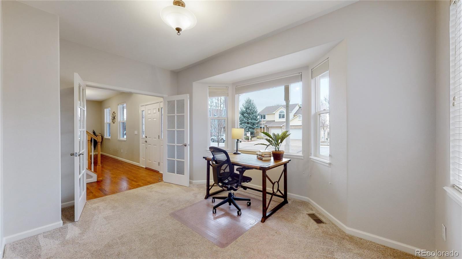 Undisclosed Address Longmont, CO 80504 - Photo 16 of 40 a view of a livingroom with furniture and a window