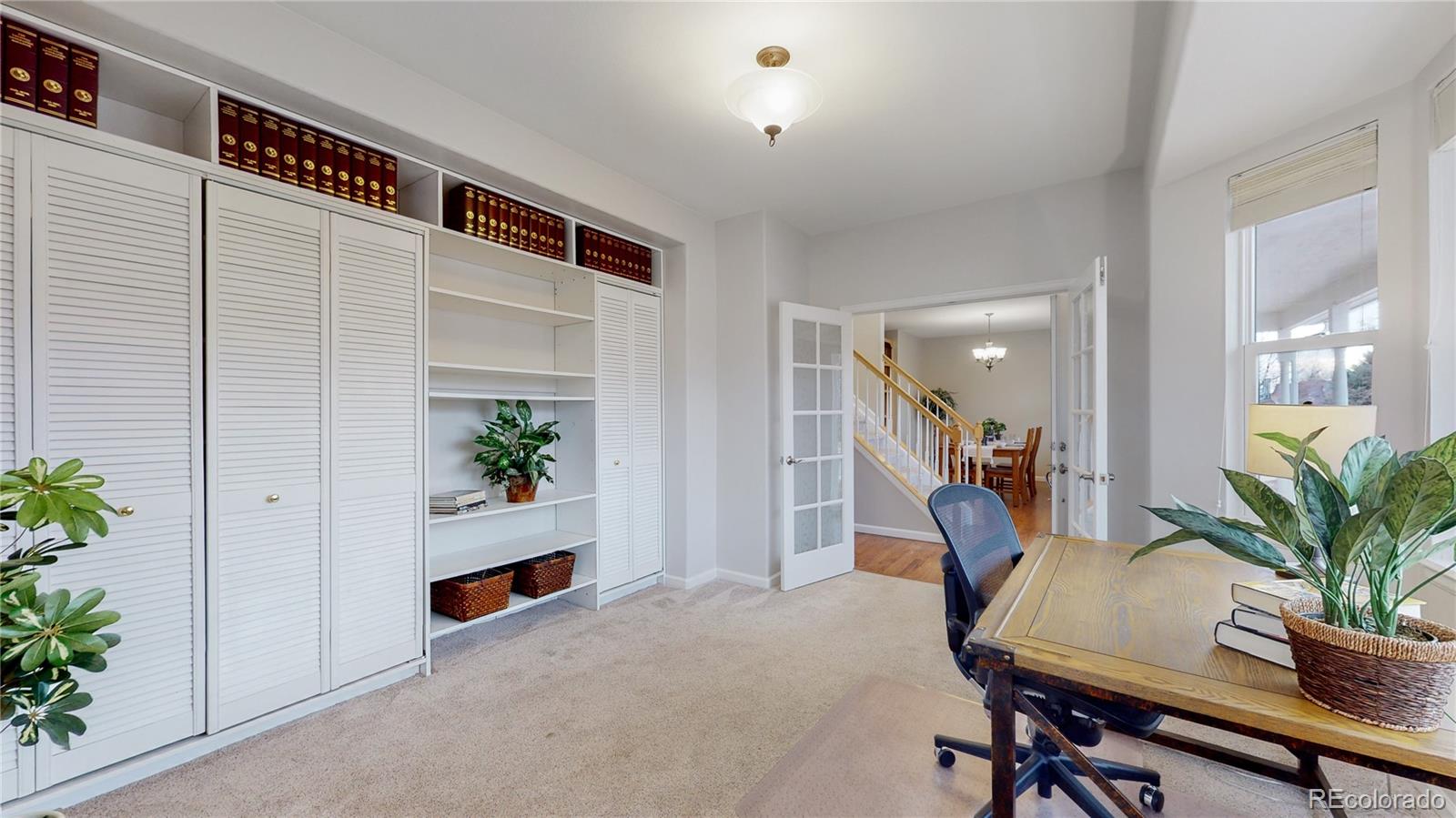 Undisclosed Address Longmont, CO 80504 - Photo 17 of 40 a workspace with furniture and a potted plant