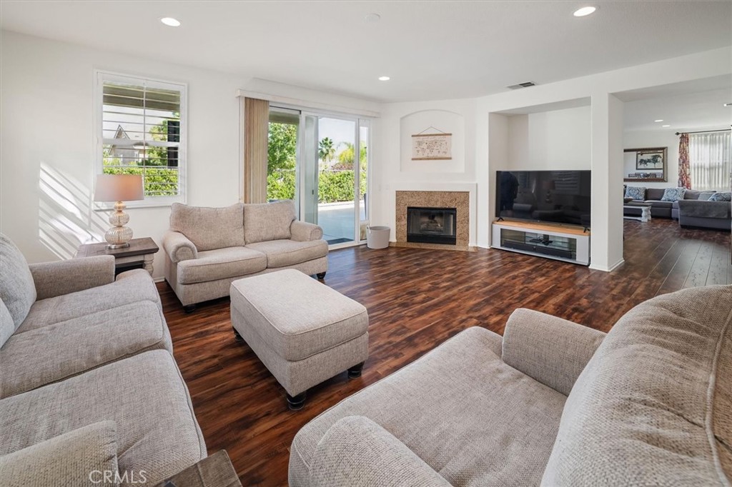 29370 Las Brisas Road Valencia, CA 91354 - Photo 17 of 57 Family room with fireplace and open to backyard!